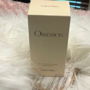 Obsession 3.4 oz never used parfum